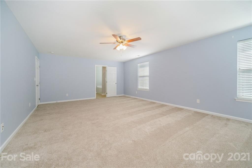 244 Lorraine Road Fort Mill, SC 29708 - Photo 17 of 33 a view of an empty room with a window