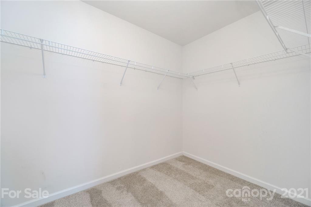 244 Lorraine Road Fort Mill, SC 29708 - Photo 18 of 33 a view of a room with racks on the wall