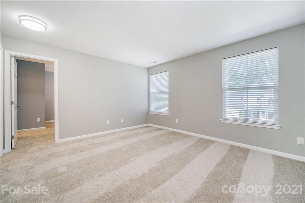 244 Lorraine Road Fort Mill, SC 29708 - Photo 23 of 33 an empty room with windows