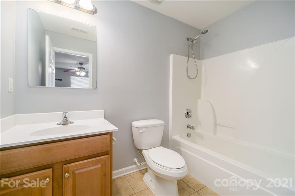244 Lorraine Road Fort Mill, SC 29708 - Photo 26 of 33 a bathroom with a sink a toilet and shower