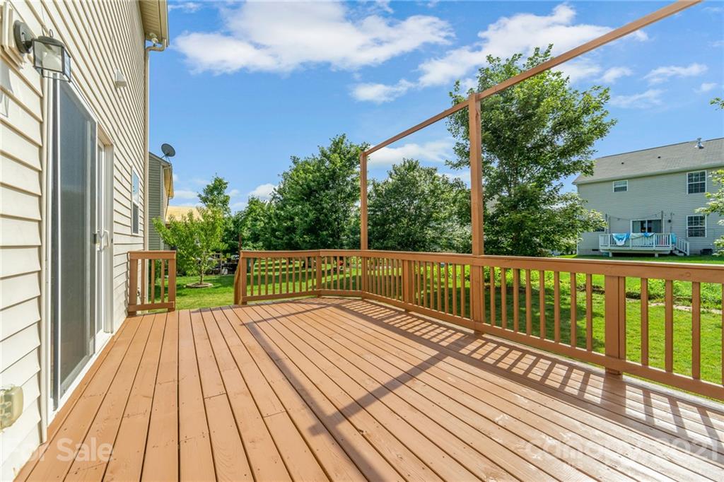 244 Lorraine Road Fort Mill, SC 29708 - Photo 30 of 33 a view of balcony with wooden floor and fence