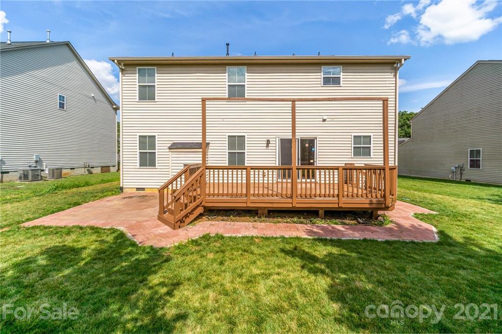 244 Lorraine Road Fort Mill, SC 29708 - Photo 33 of 33 a view of a house with a yard and deck