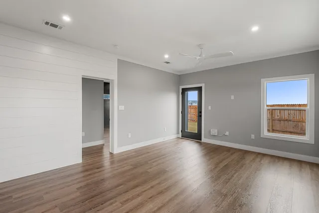 a view of kitchen with wooden floor