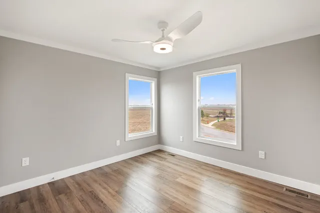 an empty room with windows