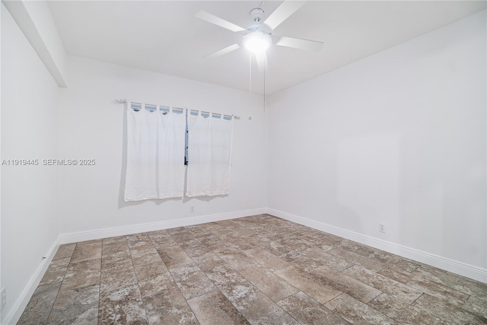 5800 Margate Boulevard, Unit 8128 Margate, FL 33063 - Photo 12 of 27 a view of an empty room