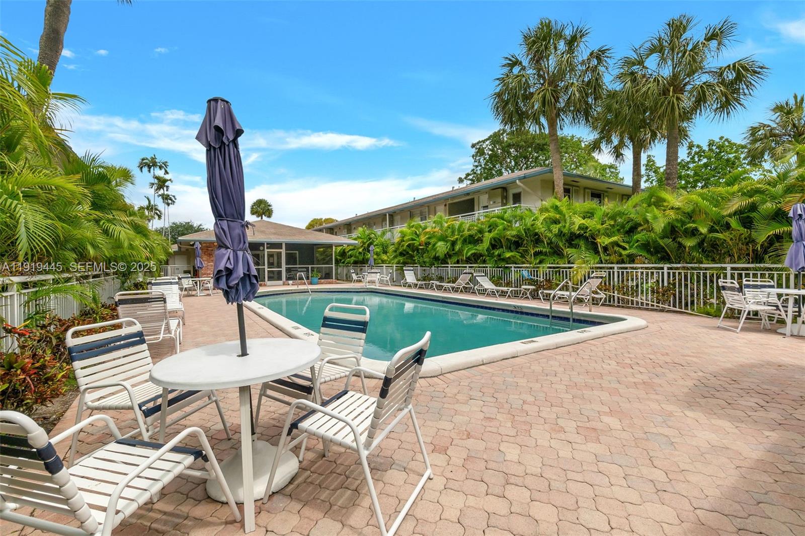 5800 Margate Boulevard, Unit 8128 Margate, FL 33063 - Photo 27 of 27 a view of a patio with a table and chairs