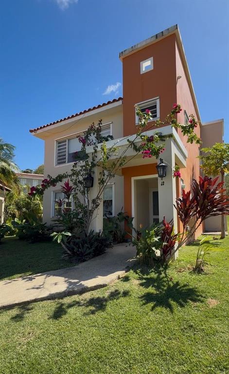 J2 St Humacao Humacao, PR 00791 - Photo 1 of 1 a front view of a house with a garden