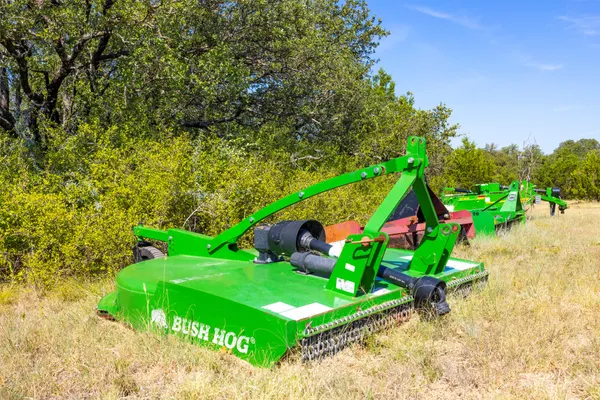 a swimming pool with outdoor seating and yard