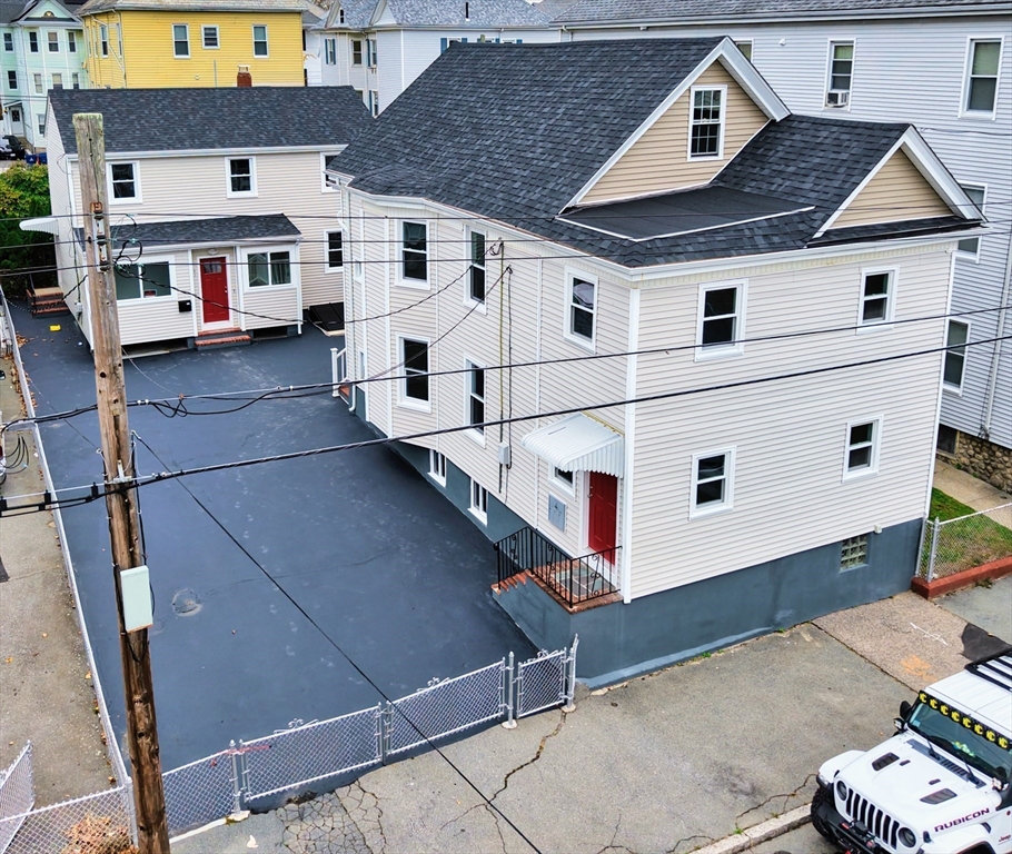 121 Whitman Street, Unit 2 New Bedford, MA 02745 - Photo 11 of 11 a view of residential houses with outdoor space