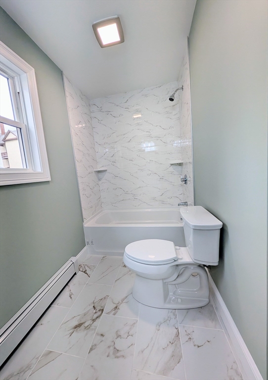 121 Whitman Street, Unit 2 New Bedford, MA 02745 - Photo 9 of 11 a bathroom with a toilet and a shower