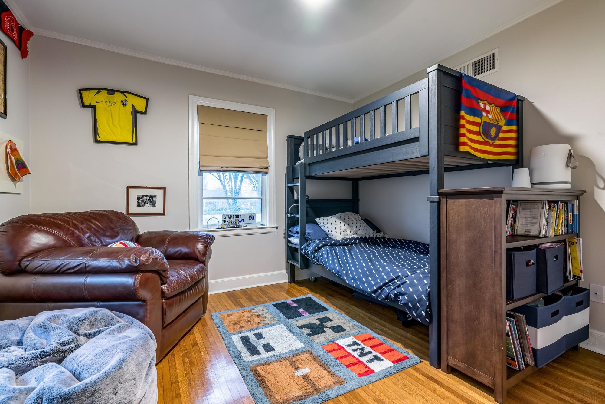 5179 Shady Grove Road Memphis, TN 38117 - Photo 25 of 25 a bedroom with a bed and wooden floor