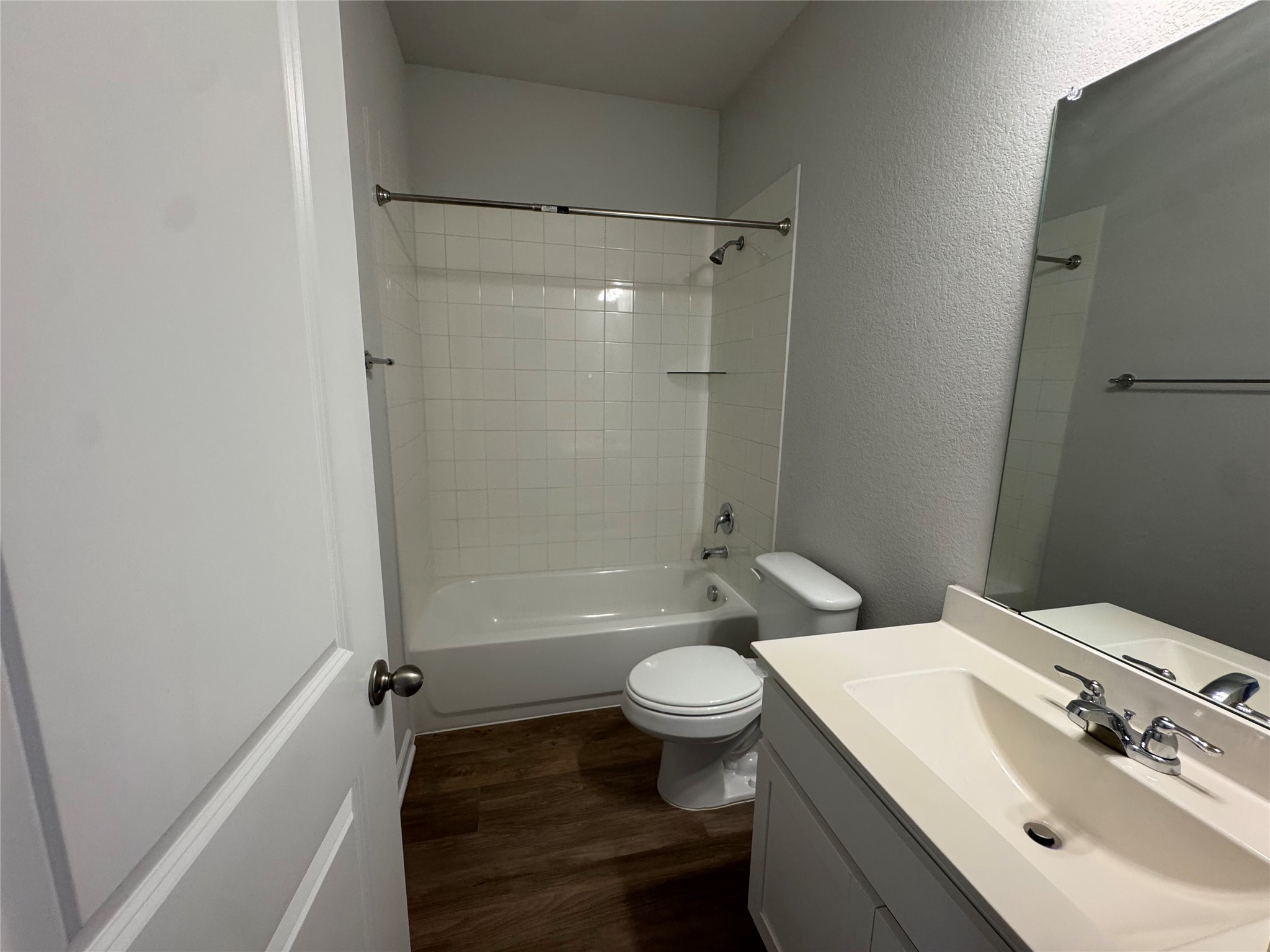 3000 Chisholm Trail Road, Unit 41 Round Rock, TX 78681 - Photo 23 of 28 A well-appointed bathroom features a tub-shower combination, modern vanity, and durable flooring.