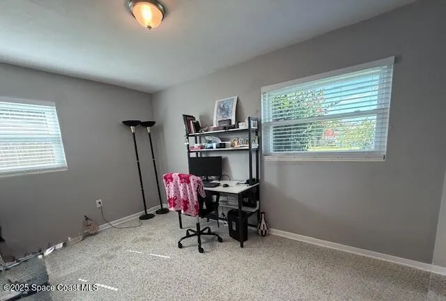 a view of hallway with wooden floor