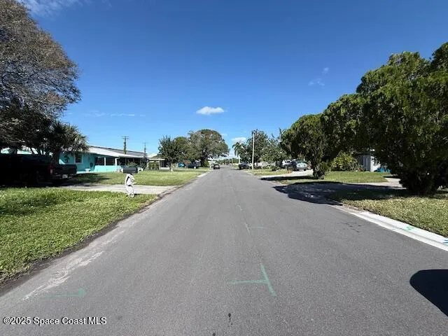 a picture of a book and a white wall