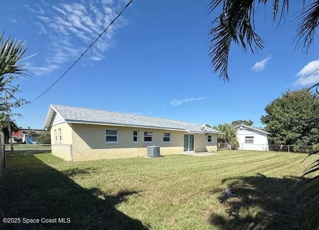 a living room with furniture a rug and a table