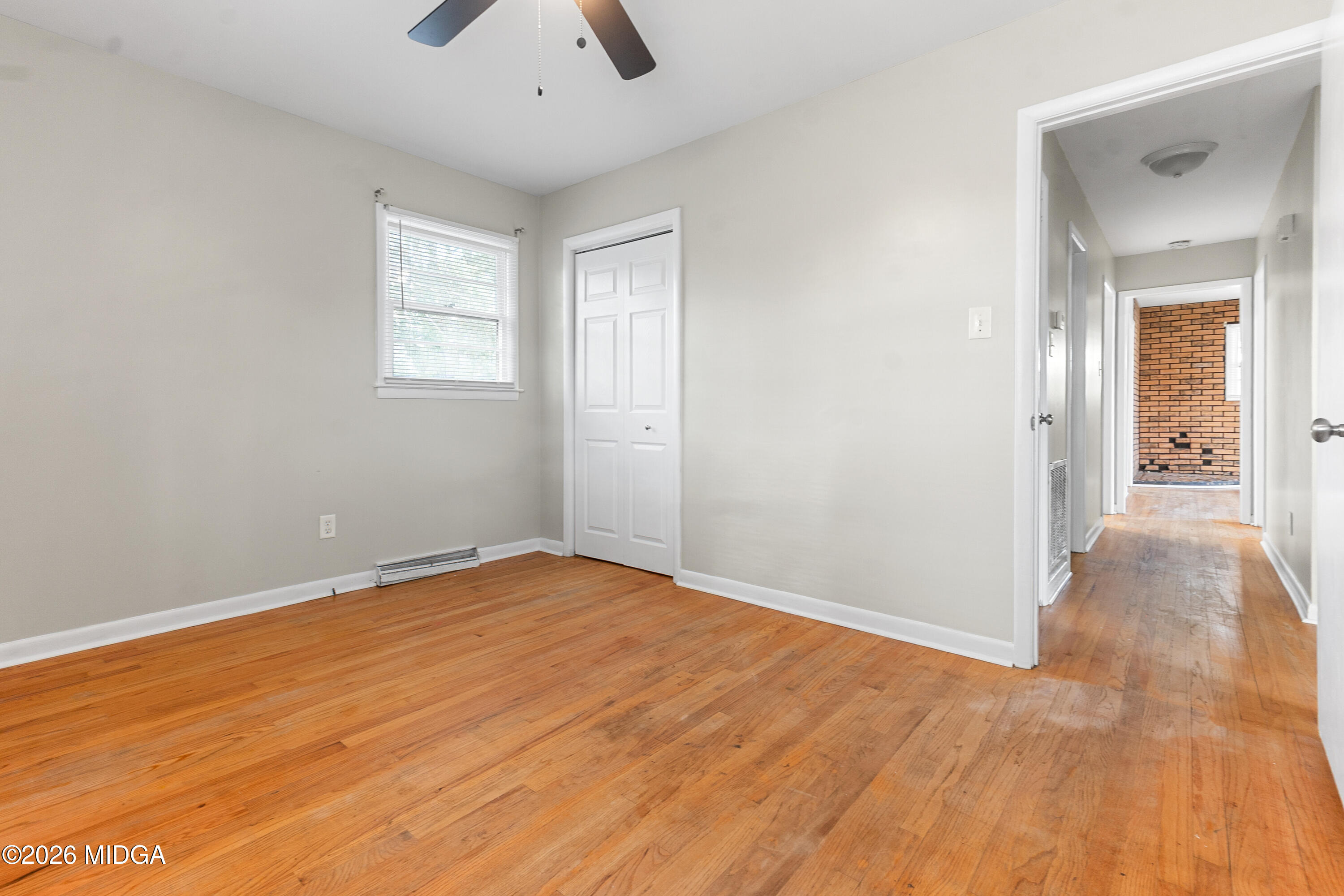 112 Athens Street Warner Robins, GA 31088 - Photo 17 of 42 a view of an empty room and window