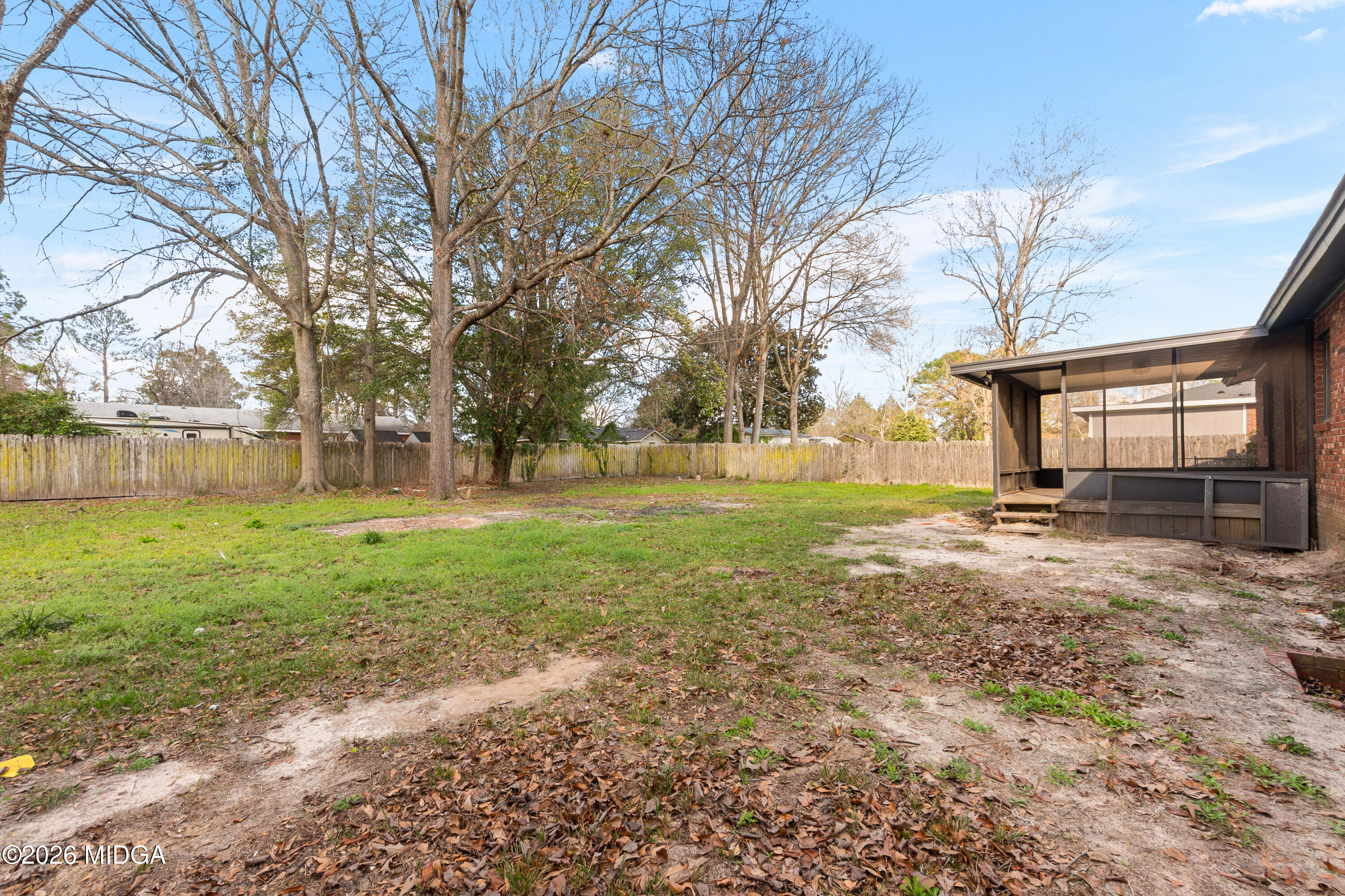 112 Athens Street Warner Robins, GA 31088 - Photo 30 of 42 a view of a yard with tree s