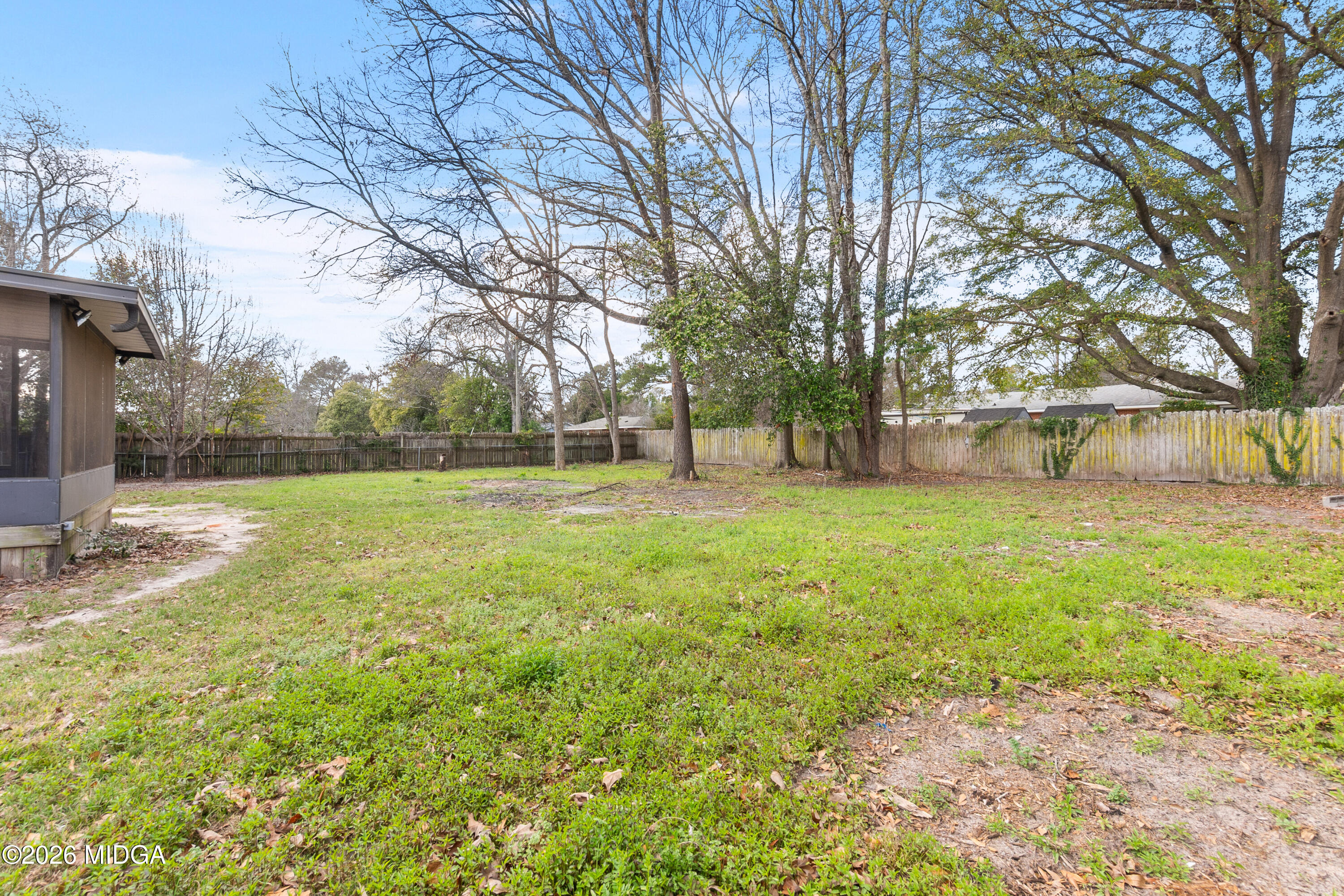 112 Athens Street Warner Robins, GA 31088 - Photo 36 of 42 a view of a backyard with large trees