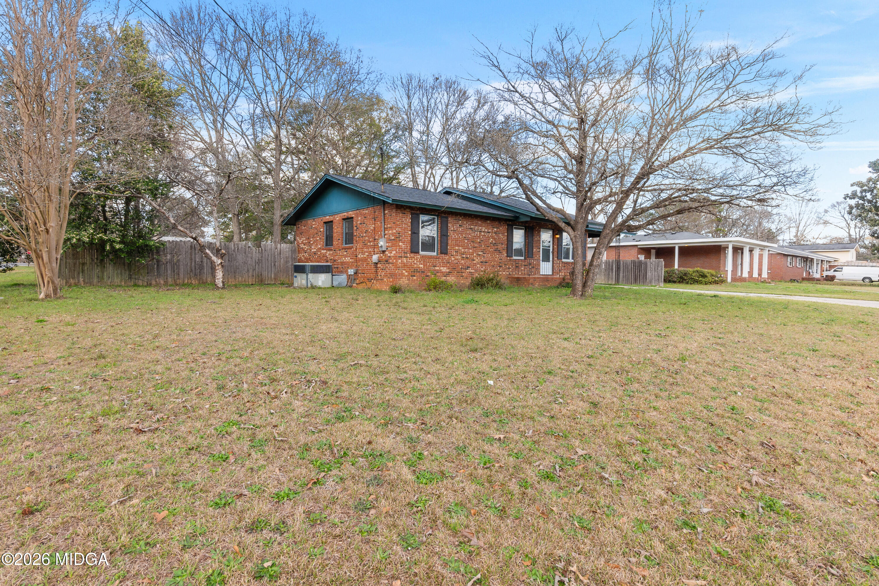 112 Athens Street Warner Robins, GA 31088 - Photo 40 of 42 a view of a house with a yard
