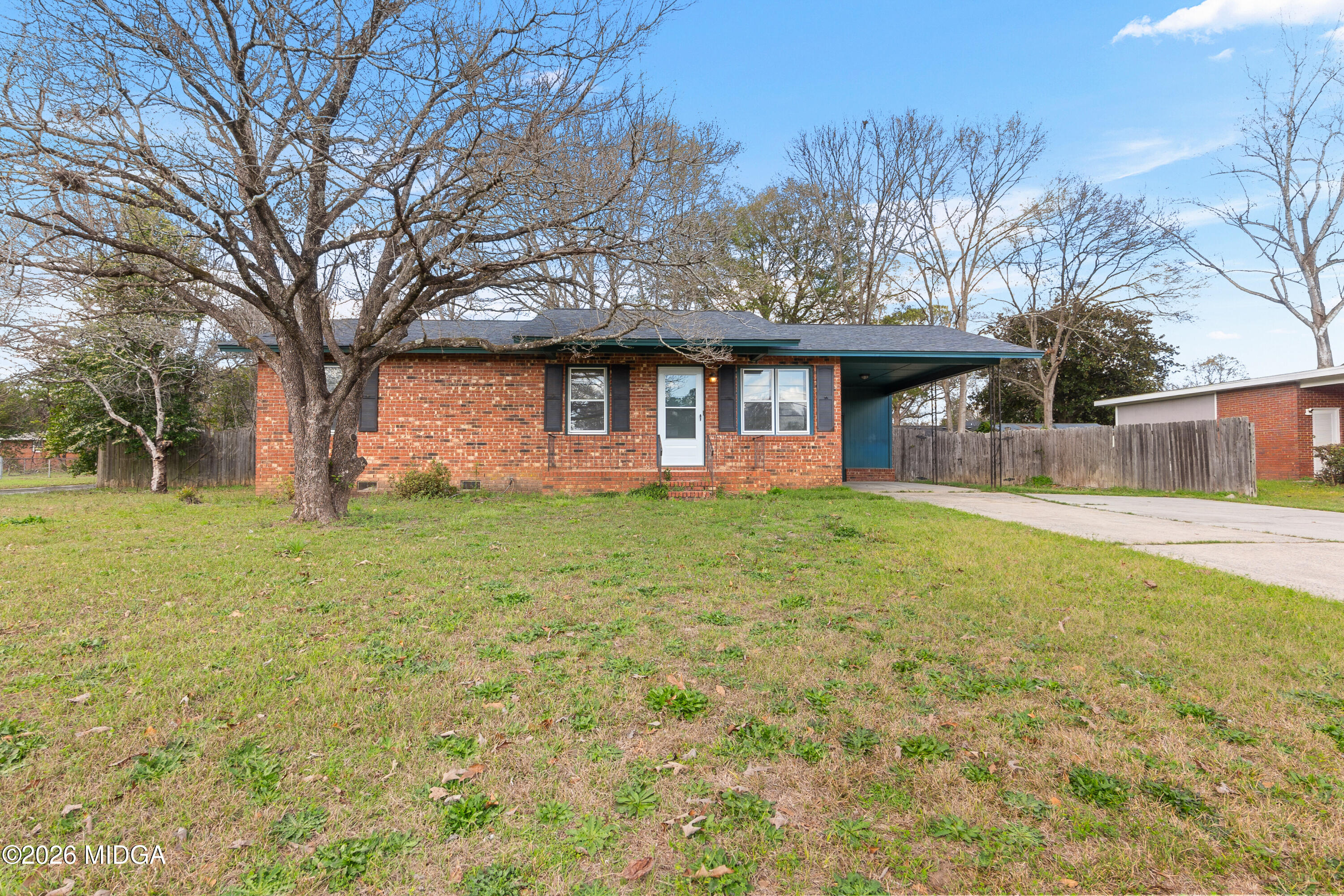 112 Athens Street Warner Robins, GA 31088 - Photo 41 of 42 front view of a house with a yard