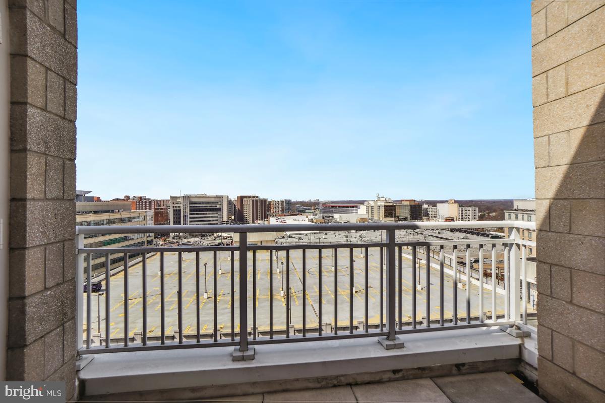 930 Wayne Avenue, Unit 1407 Silver Spring, MD 20910 - Photo 16 of 31 a view of a building from a balcony