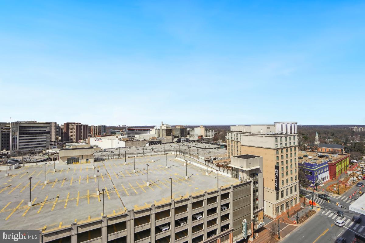 930 Wayne Avenue, Unit 1407 Silver Spring, MD 20910 - Photo 18 of 31 a view of a terrace with seating space