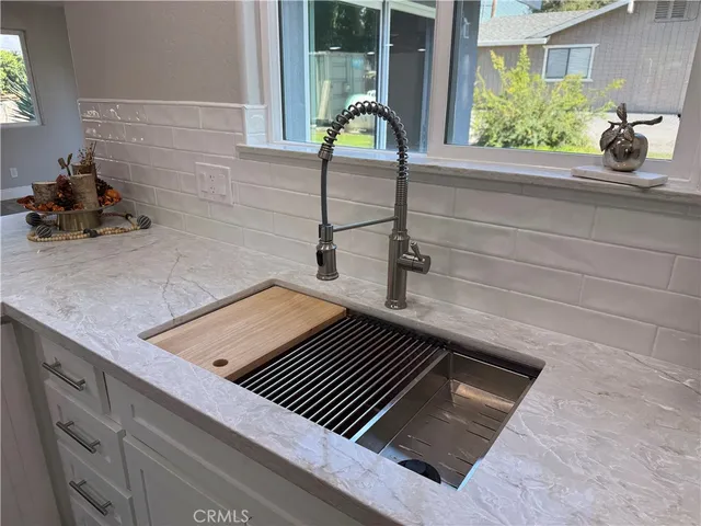 a view of a backyard with a patio