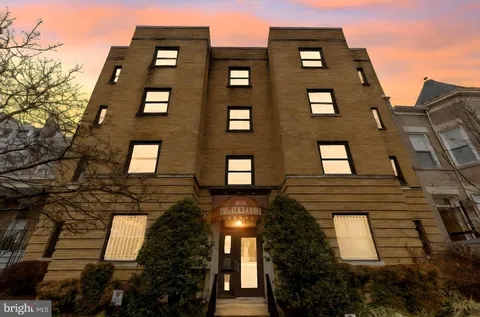 a front view of a multi story residential apartment building
