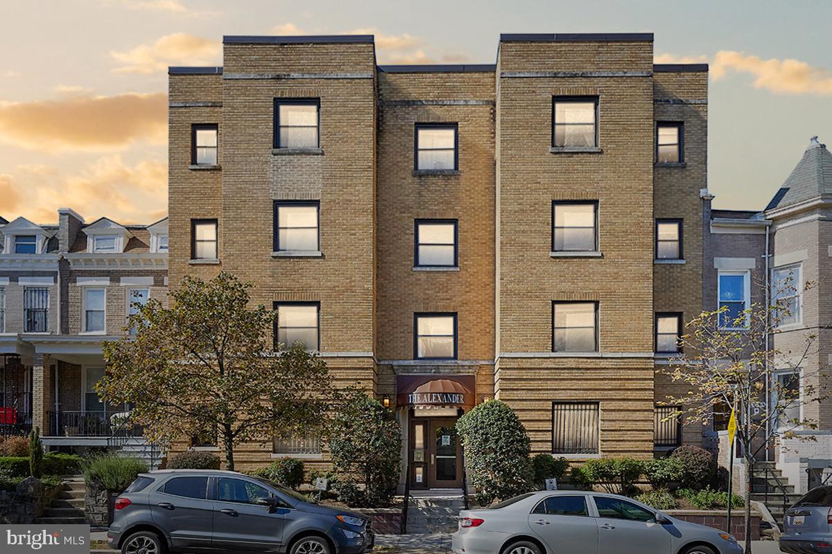 3534 10th Street Northwest, Unit 200 Washington, DC 20010 - Photo 29 of 34 a front view of a building with car parked