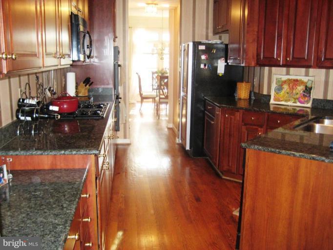 138 Rees Place Falls Church, VA 22046 - Photo 8 of 16 Gourmet kit w/granite counters, cherry cabs, desk
