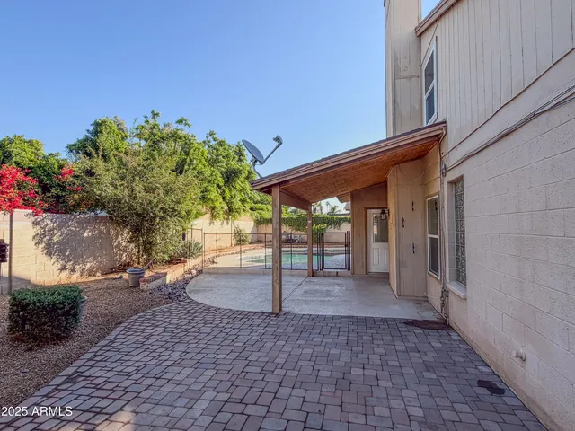 a view of a pathway with a building in the background
