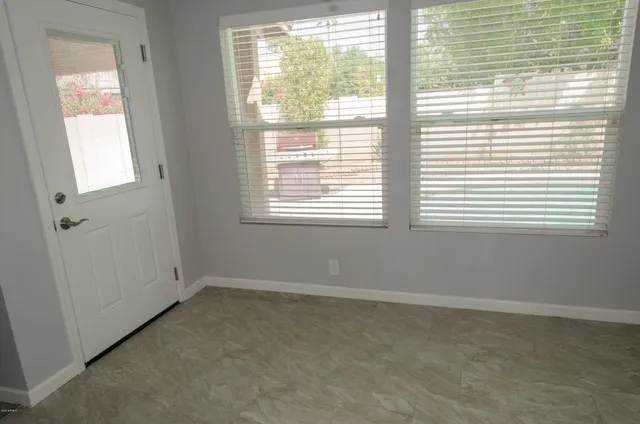 an empty room with a window