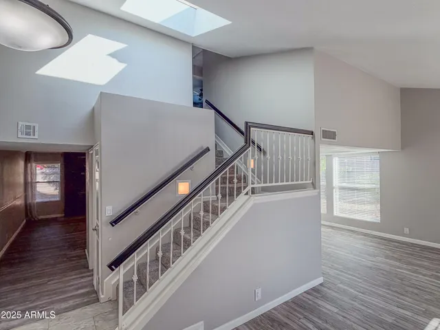a view of entryway with wooden floor