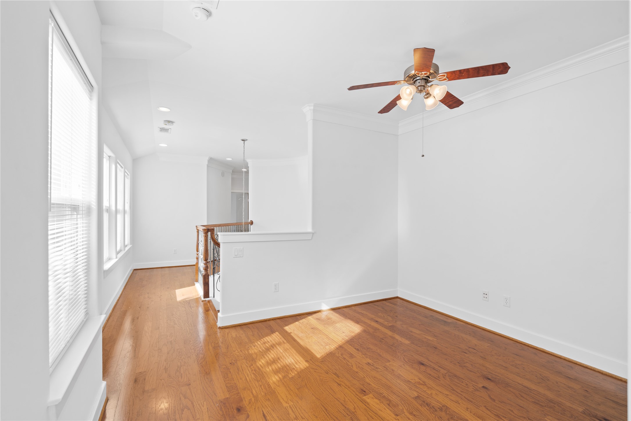 3006 McCulloch Circle Houston, TX 77056 - Photo 18 of 29 a view of empty room with wooden floor and fan