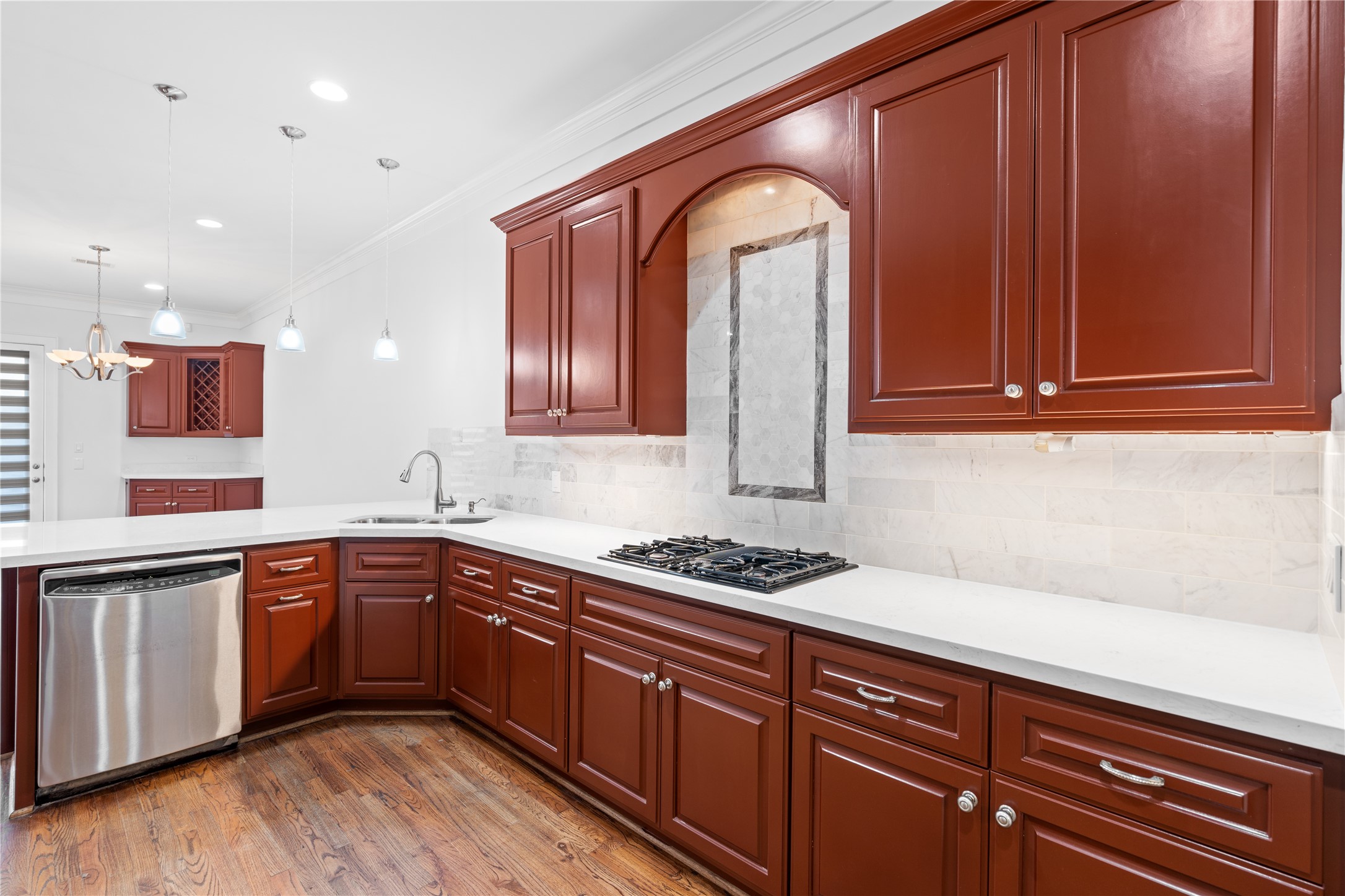 3006 McCulloch Circle Houston, TX 77056 - Photo 9 of 29 a kitchen with stainless steel appliances granite countertop a sink a stove cabinets and wooden floor