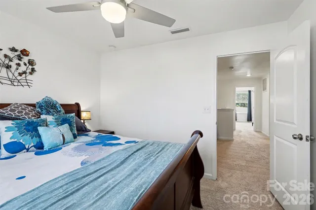 a view of a livingroom with furniture and wooden floor