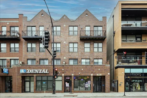 a front view of a building and a street