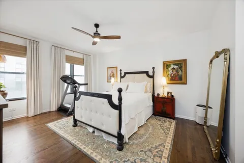 a bed room with a bed and a window