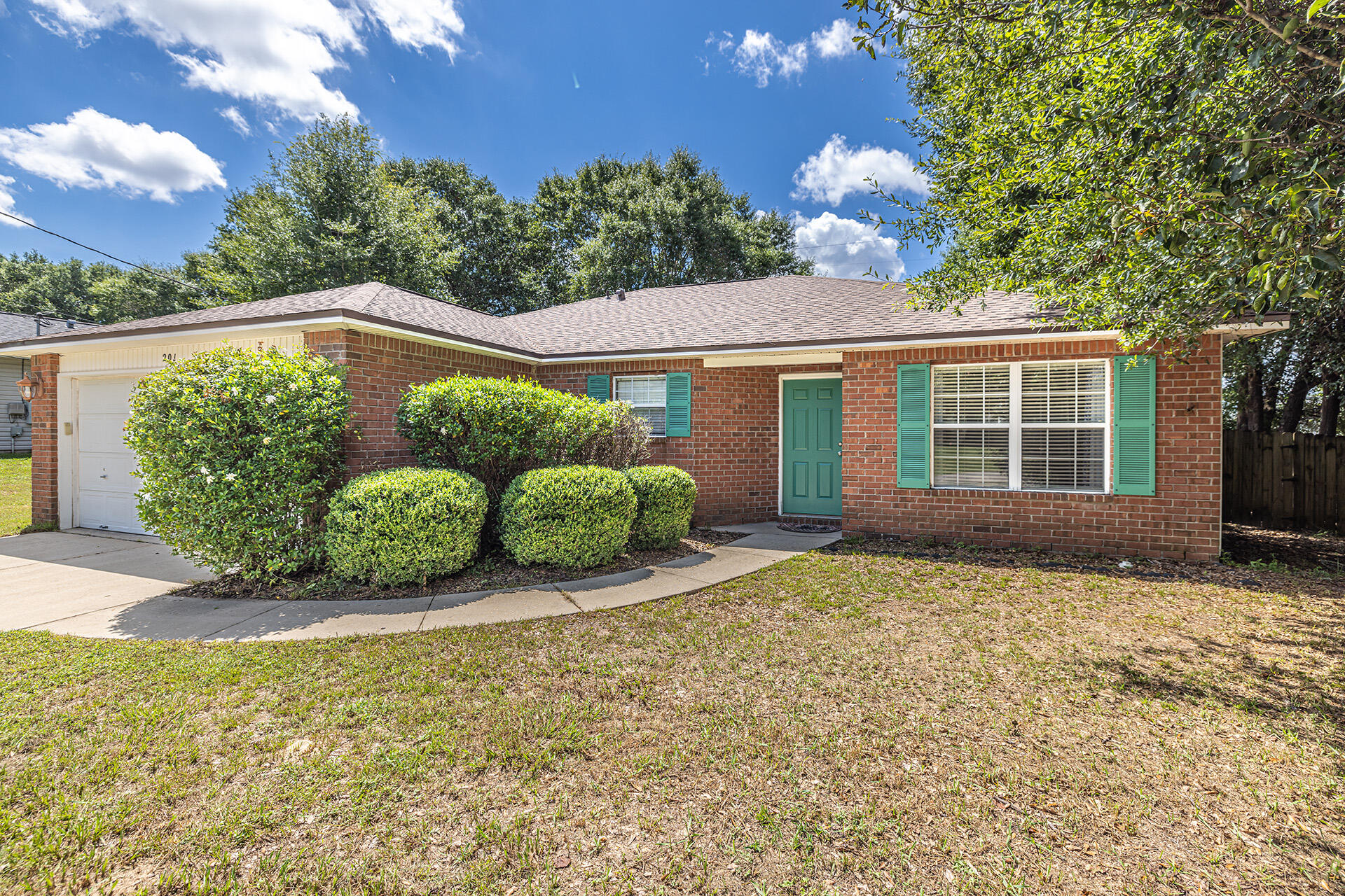 201 Lustan Drive Crestview, FL 32536 - Photo 2 of 34 a view of a house with backyard and garden
