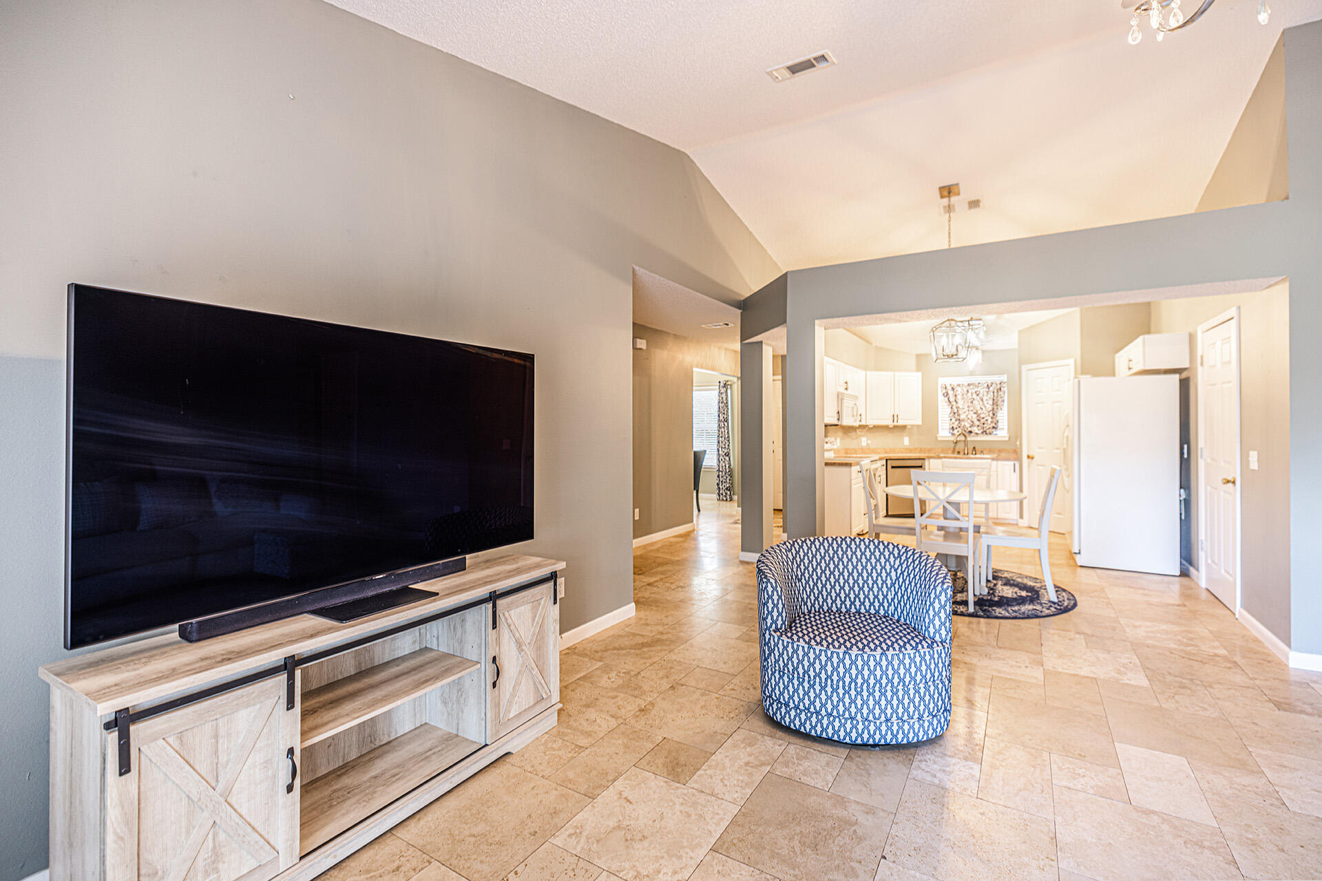 201 Lustan Drive Crestview, FL 32536 - Photo 26 of 34 a living room with furniture and a flat screen tv