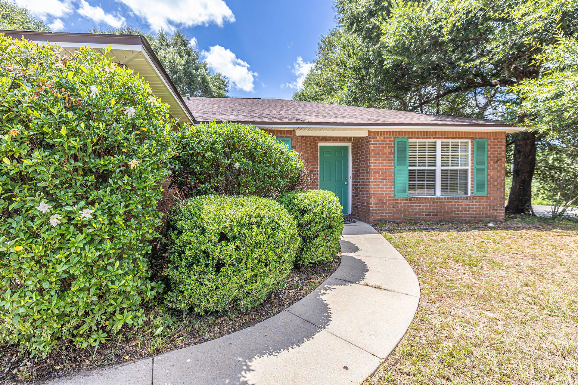 201 Lustan Drive Crestview, FL 32536 - Photo 3 of 34 front view of a house with a yard
