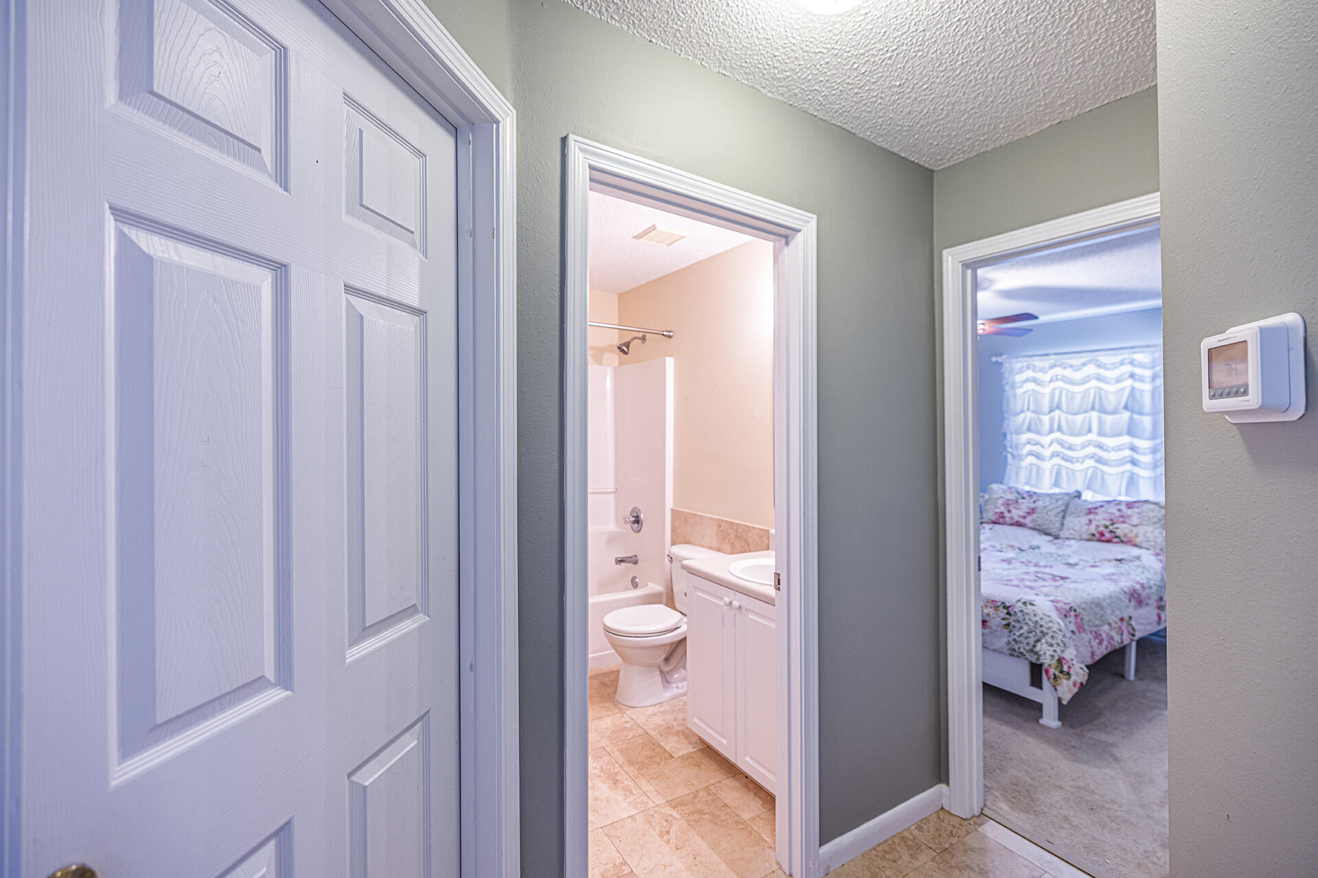 201 Lustan Drive Crestview, FL 32536 - Photo 31 of 34 a view of a bathroom from a hallway