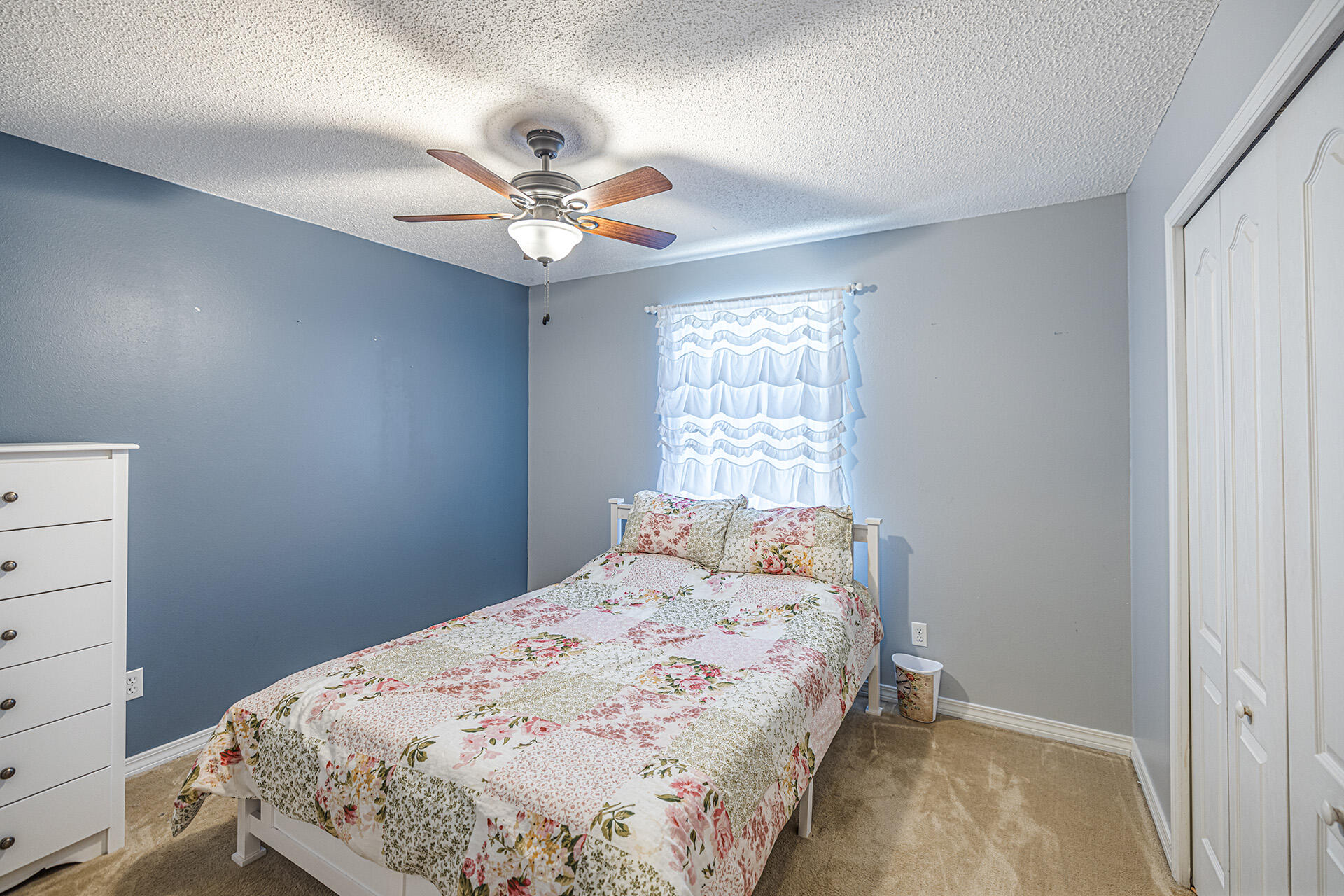 201 Lustan Drive Crestview, FL 32536 - Photo 32 of 34 a bedroom with a bed and a window