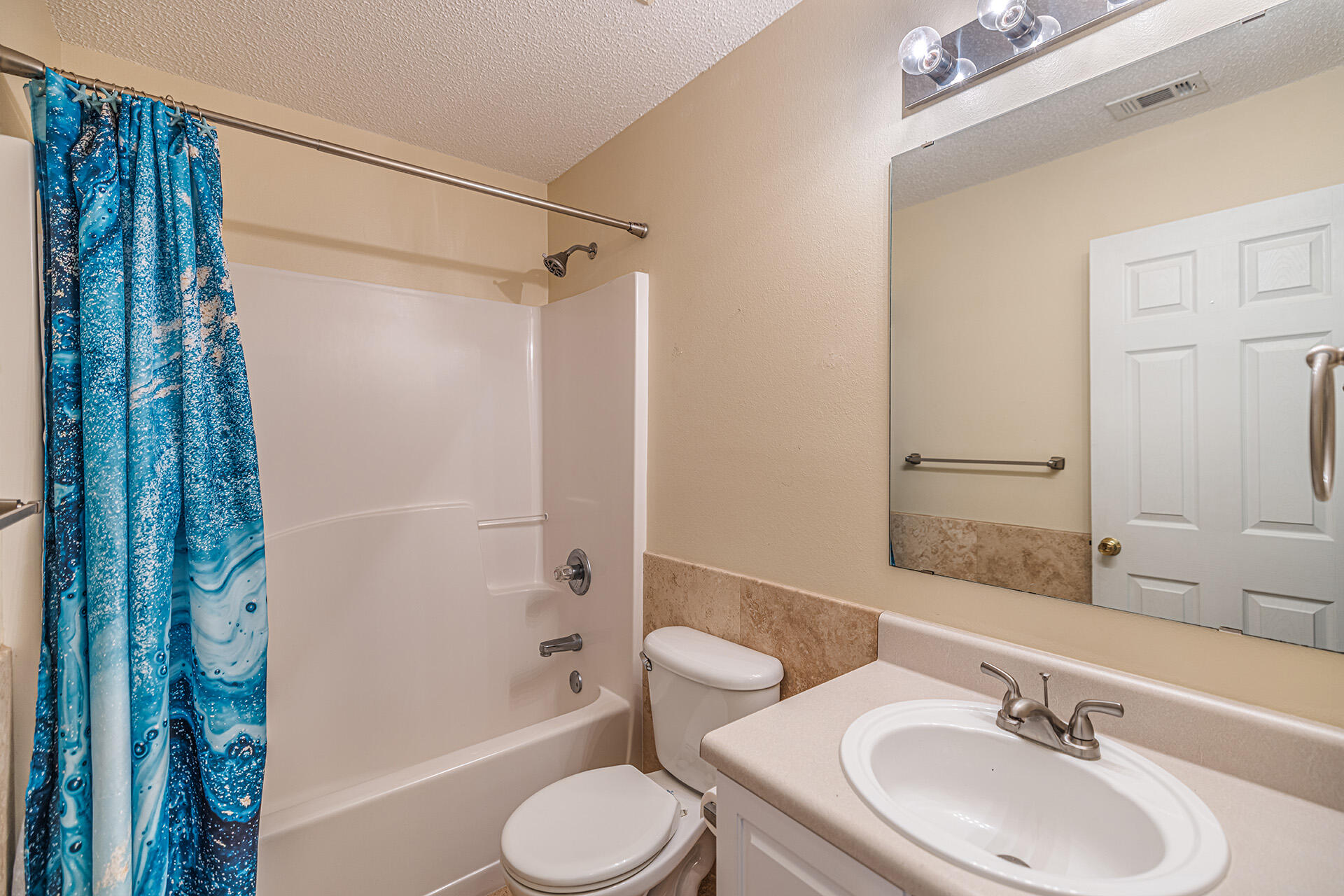 201 Lustan Drive Crestview, FL 32536 - Photo 33 of 34 a bathroom with a sink toilet and shower