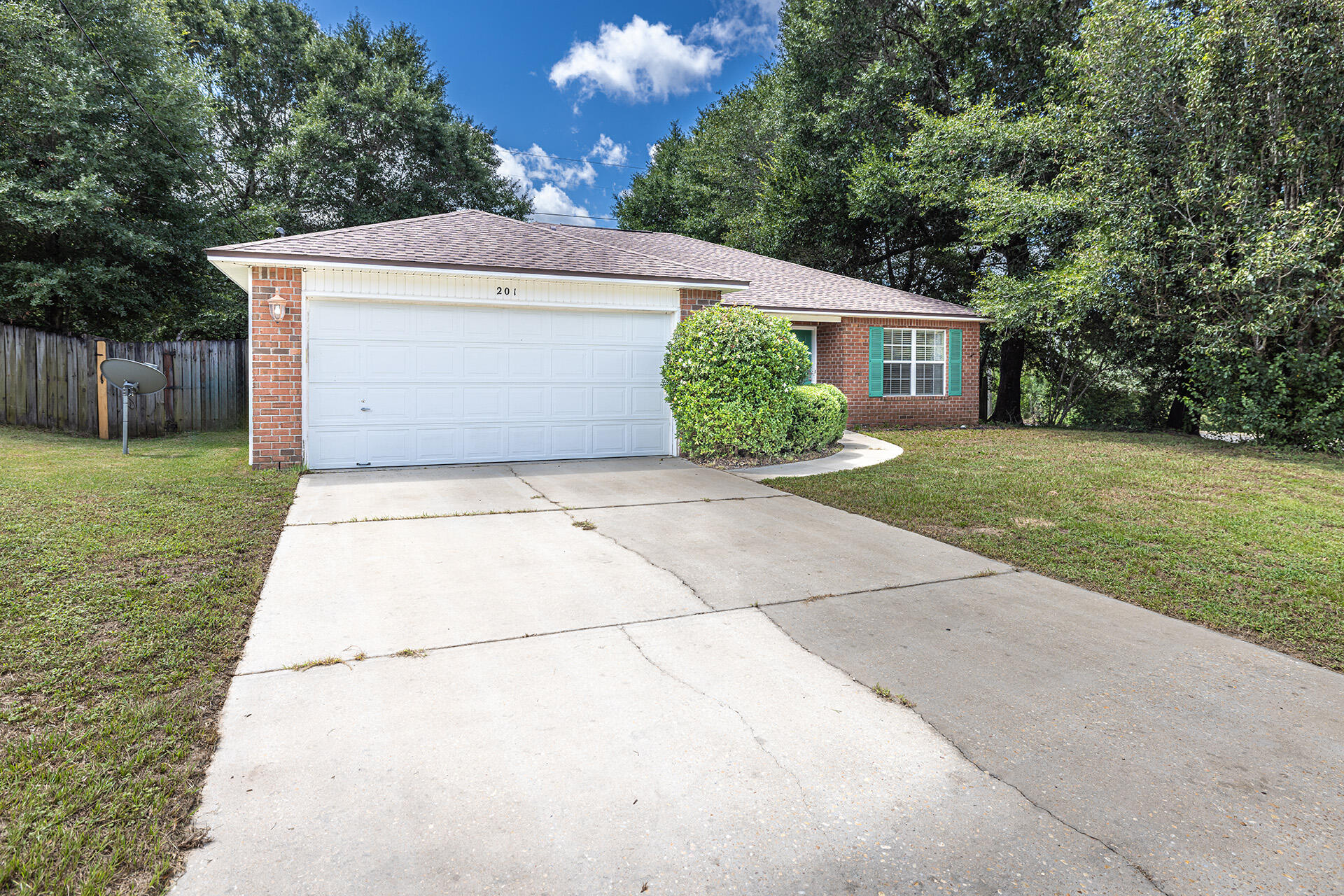 201 Lustan Drive Crestview, FL 32536 - Photo 4 of 34 a front view of a house with yard