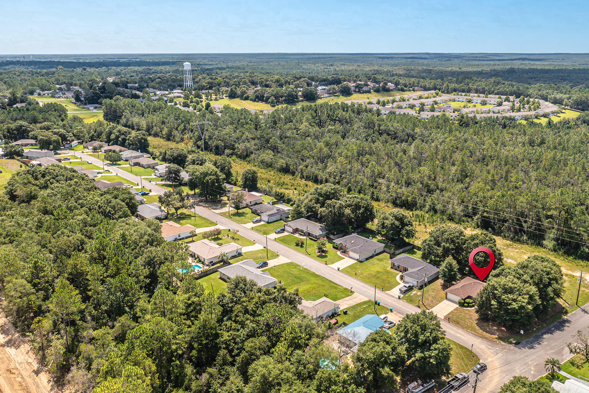 201 Lustan Drive Crestview, FL 32536 - Photo 7 of 34 an aerial view of residential houses with outdoor space