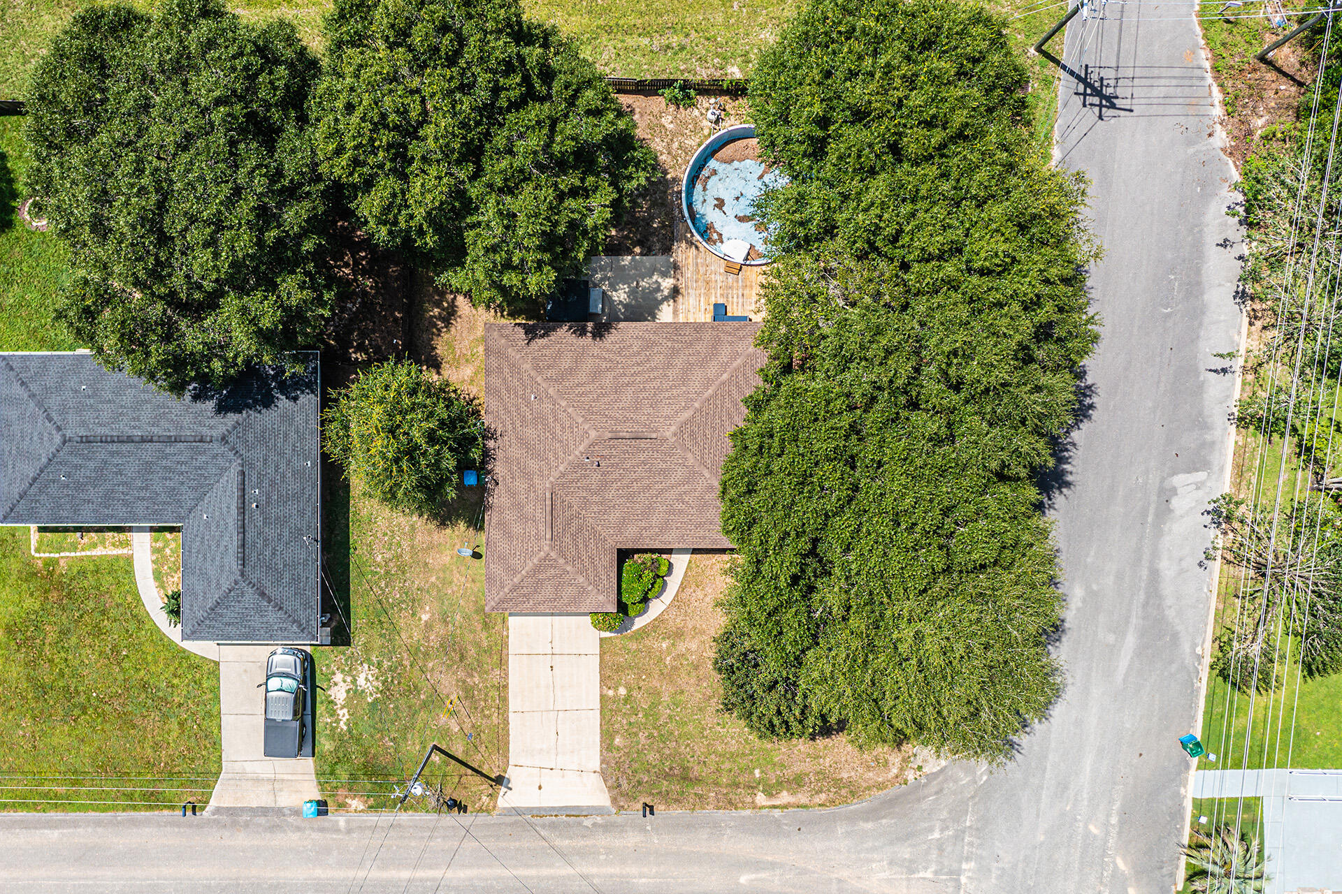 201 Lustan Drive Crestview, FL 32536 - Photo 8 of 34 an aerial view of a house with a yard basket ball court and outdoor seating