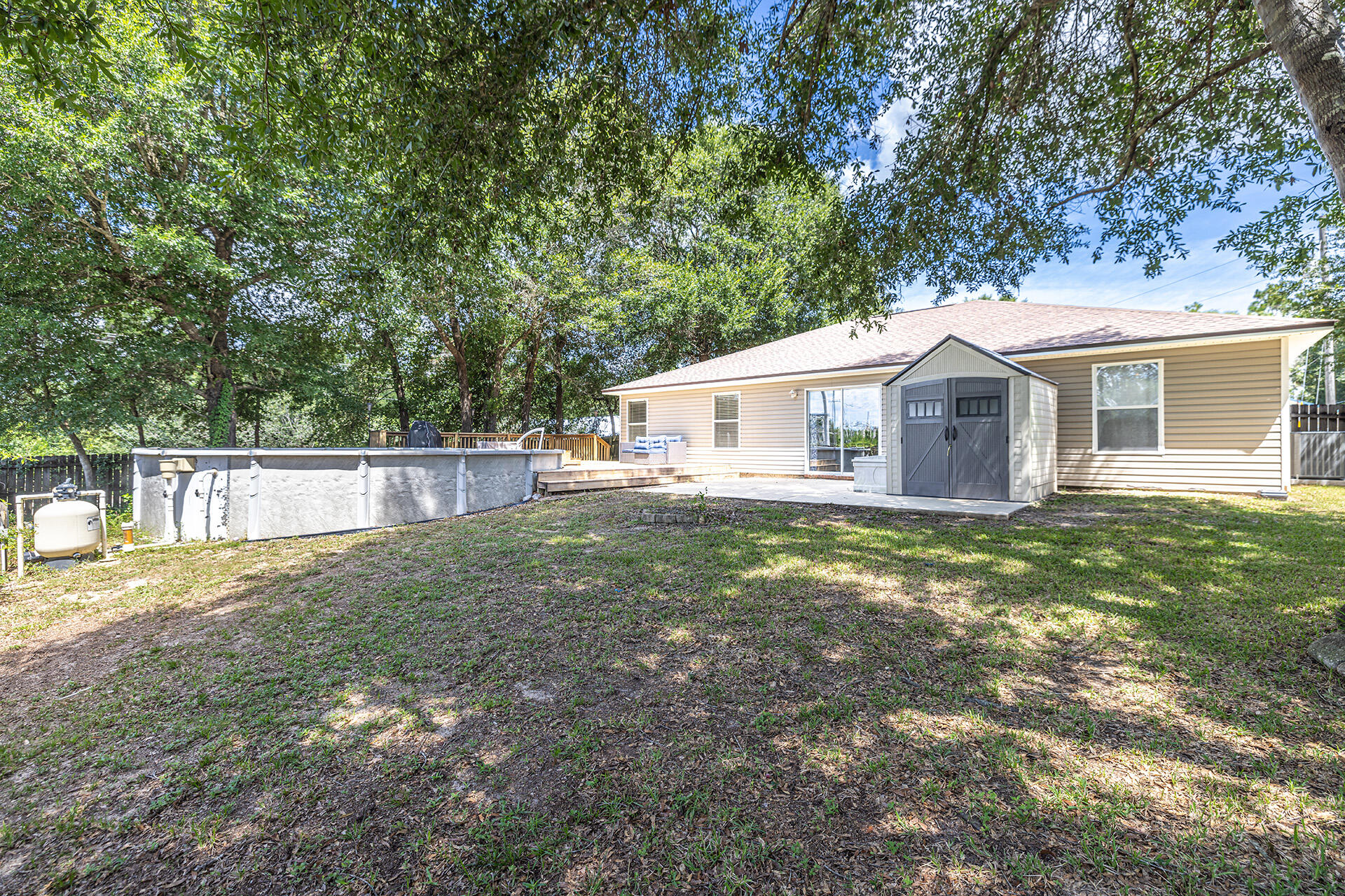 201 Lustan Drive Crestview, FL 32536 - Photo 9 of 34 a view of a house with a backyard