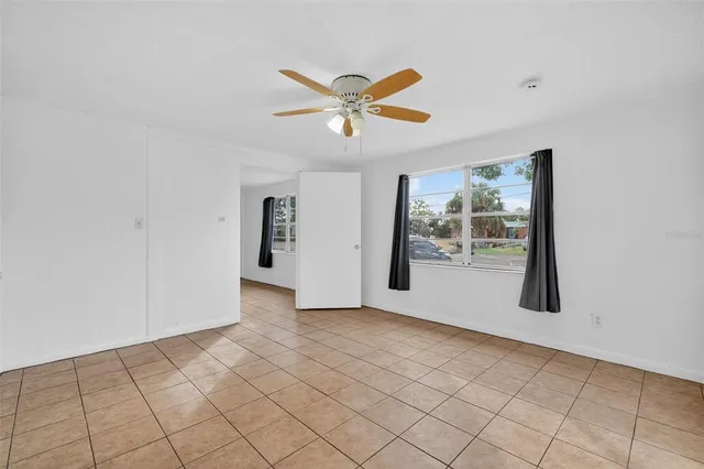 a view of an empty room and window