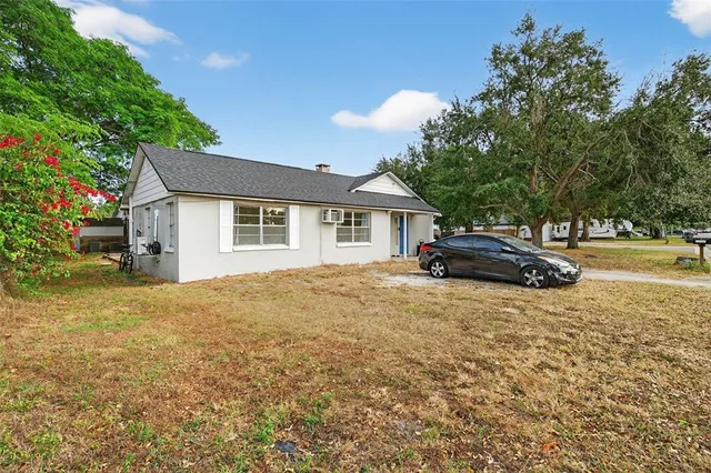 a house view with a garden space